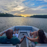 Couple sunset cruise holding hands San Juan Puerto Rico 2 copy – Oceania Boat Tours & Charters